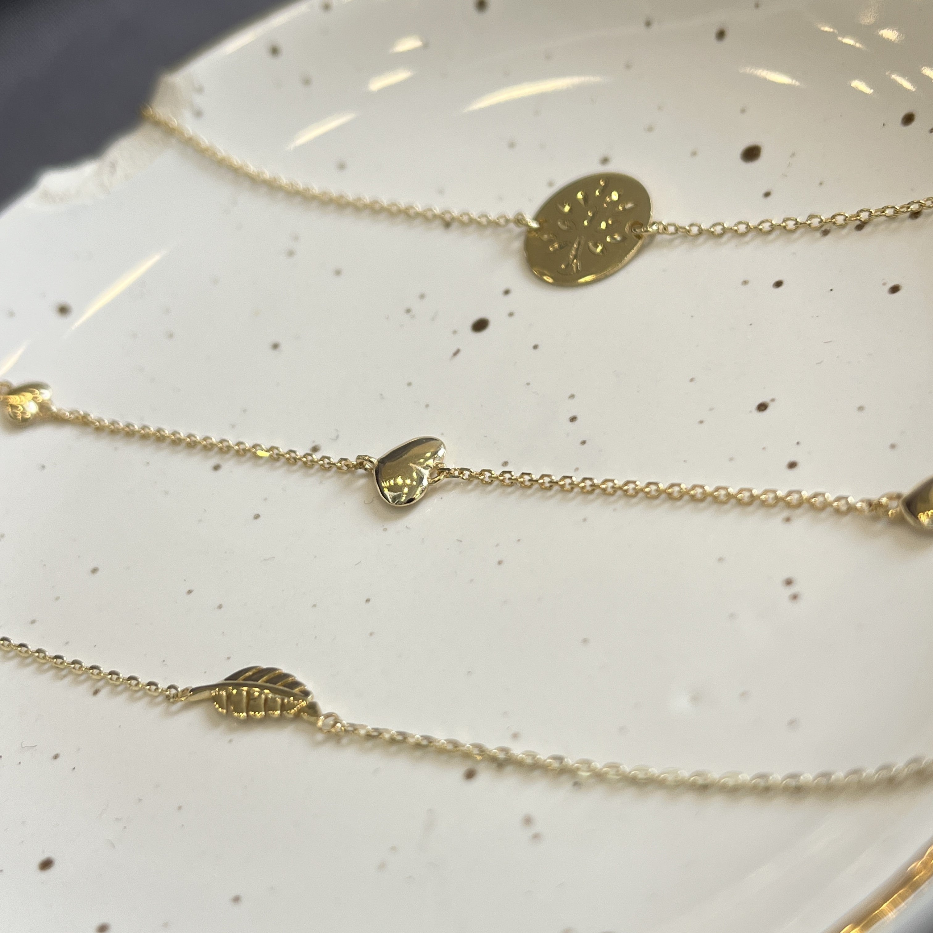 9 karat guldarmbånd med hjerter