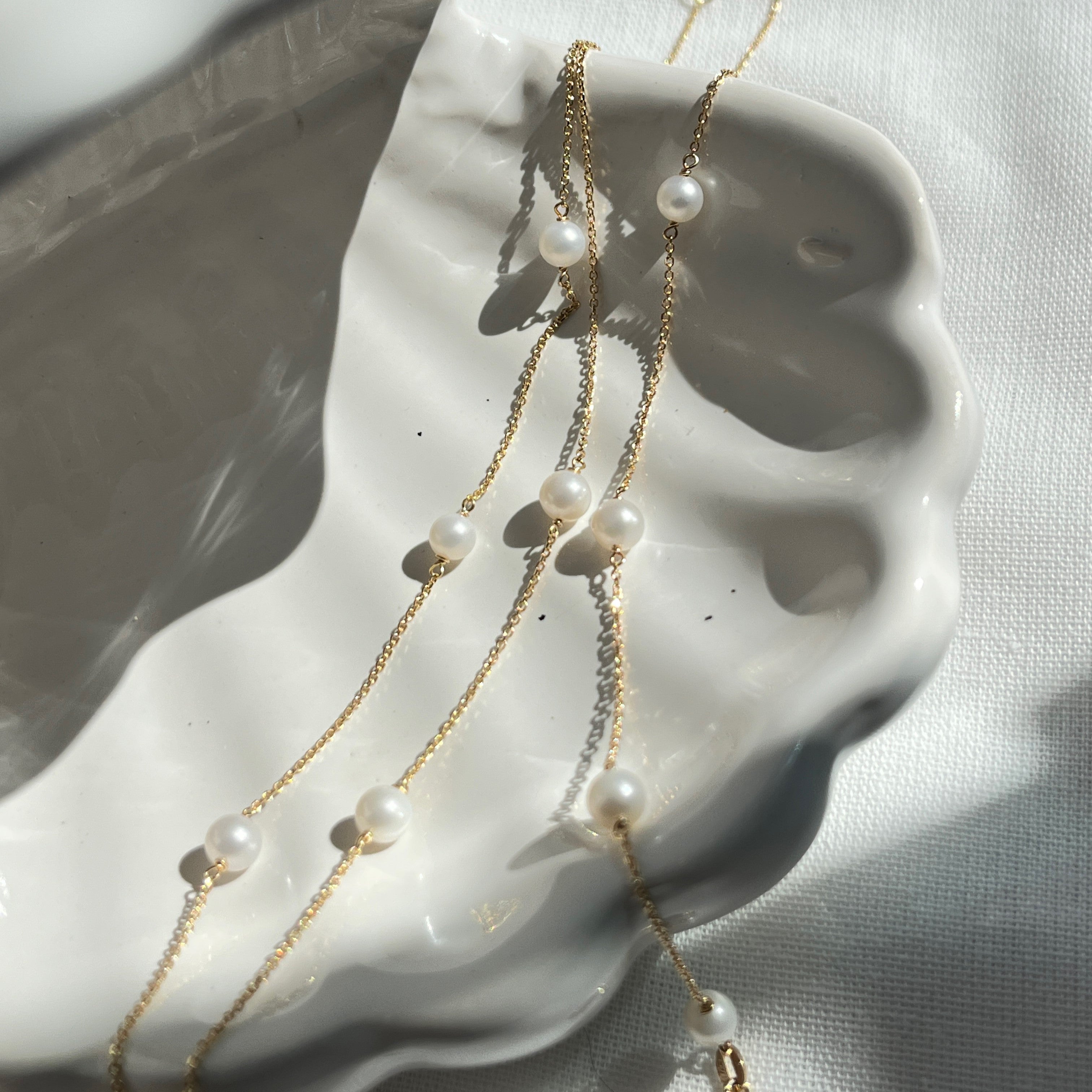 9 karat guldarmbånd med ferskavandsperler