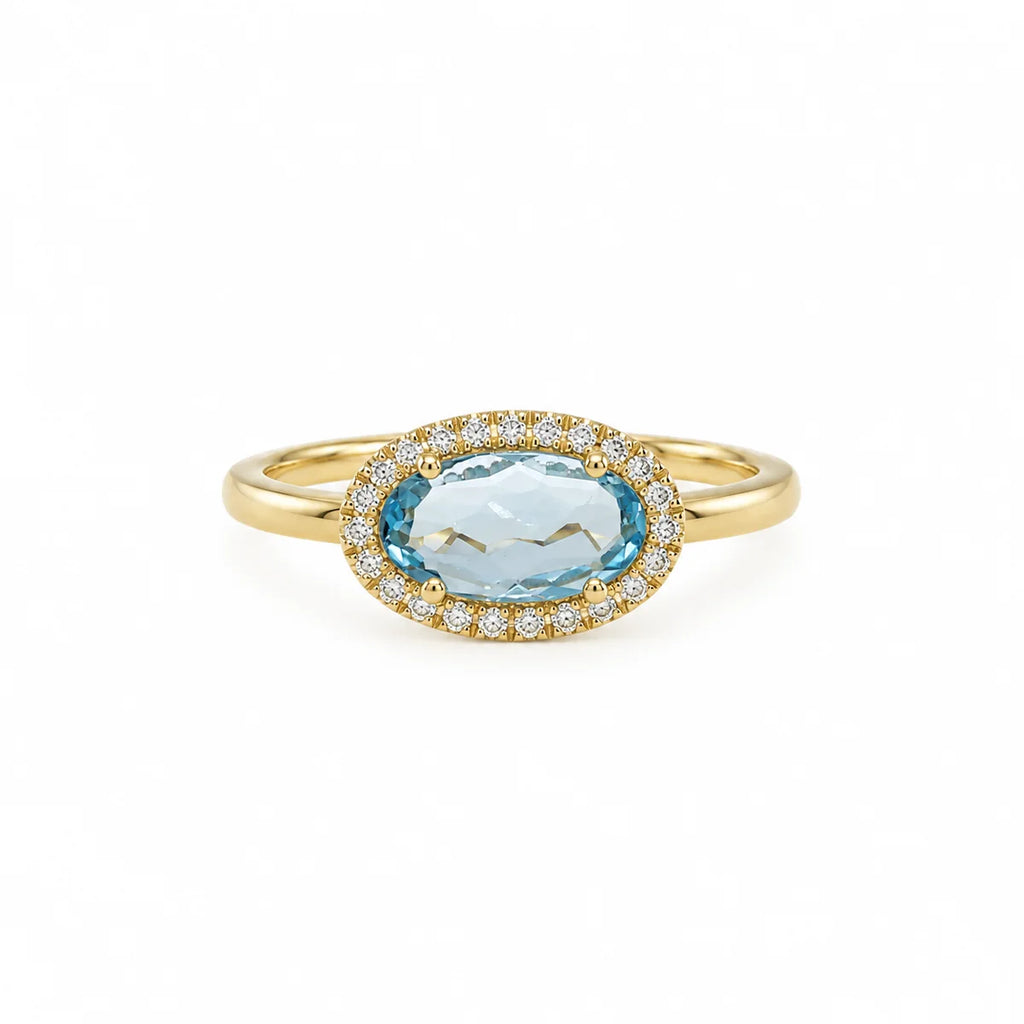 Celeste – Eksklusiv ring i 14 karat guld med Swiss Blue Topas og diamanter