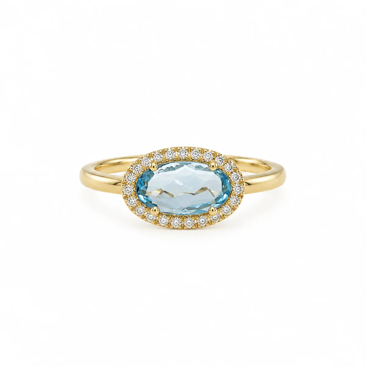 Celeste – Eksklusiv ring i 14 karat guld med Swiss Blue Topas og diamanter